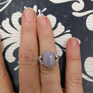 Sterling silver size 5 ring w/ light purple stone